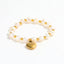 Elastische 18K goud vergulde armband met parel en hart charm