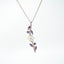 Zilveren ketting met magnolia design en synthetische amethist steentjes